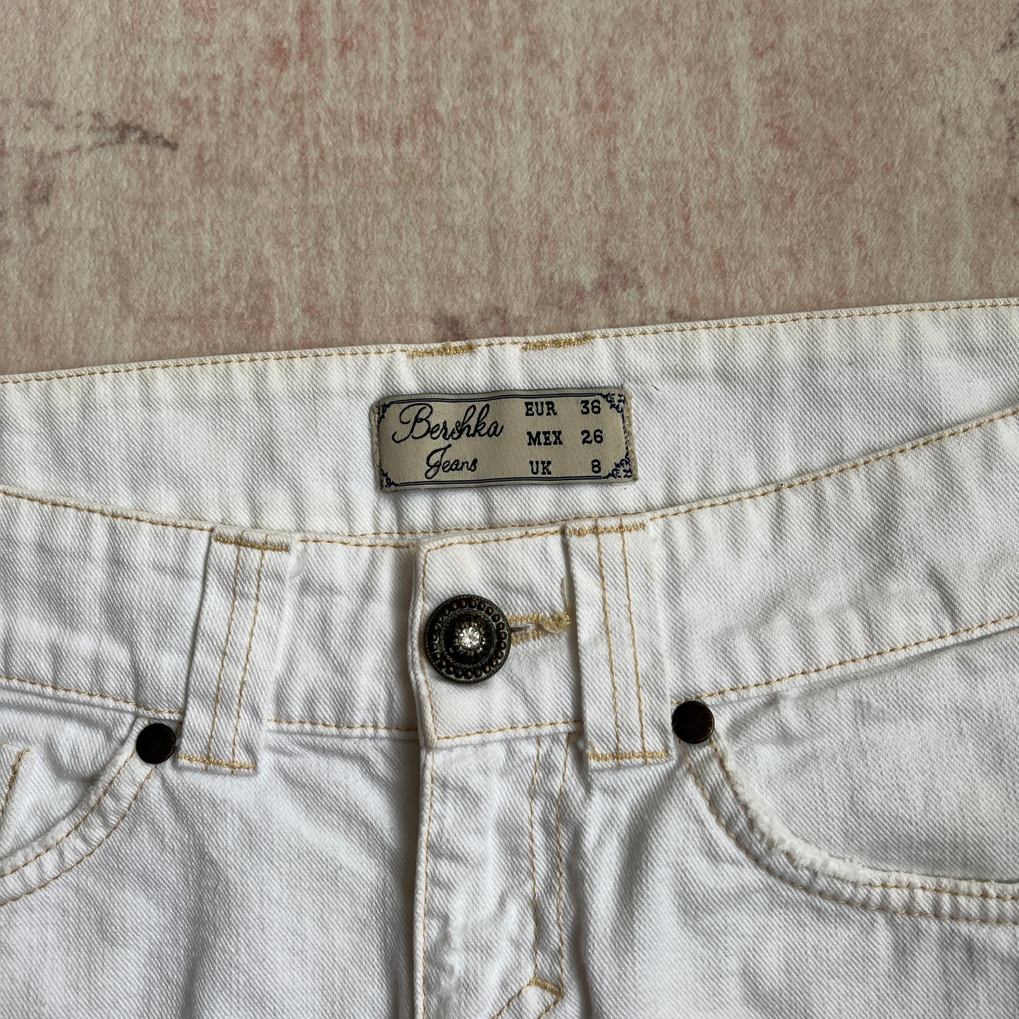 2000s bsk white mini skirt