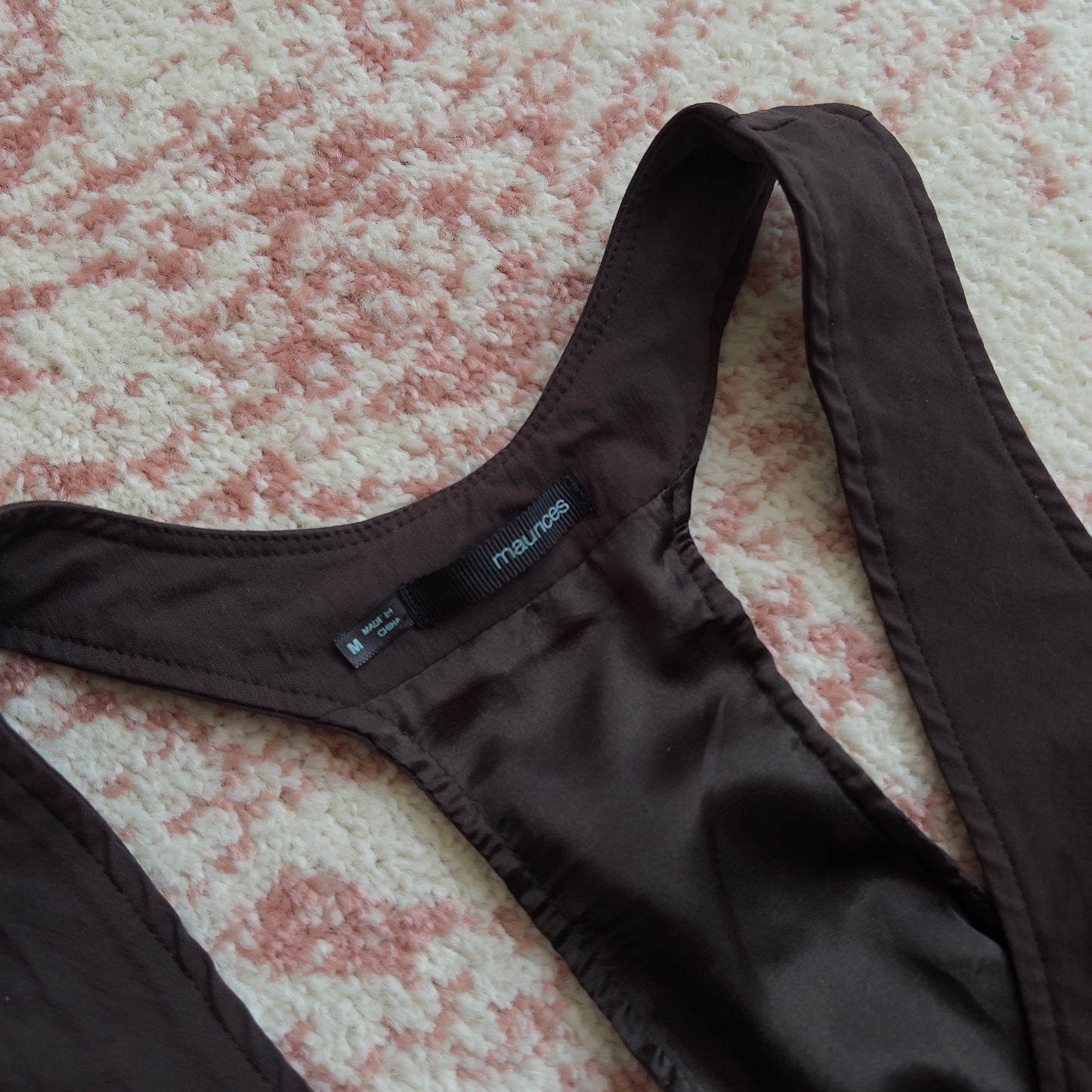 2000s horror game protagonist brown vest with lace details