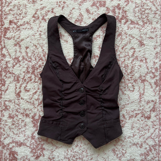 2000s horror game protagonist brown vest with lace details